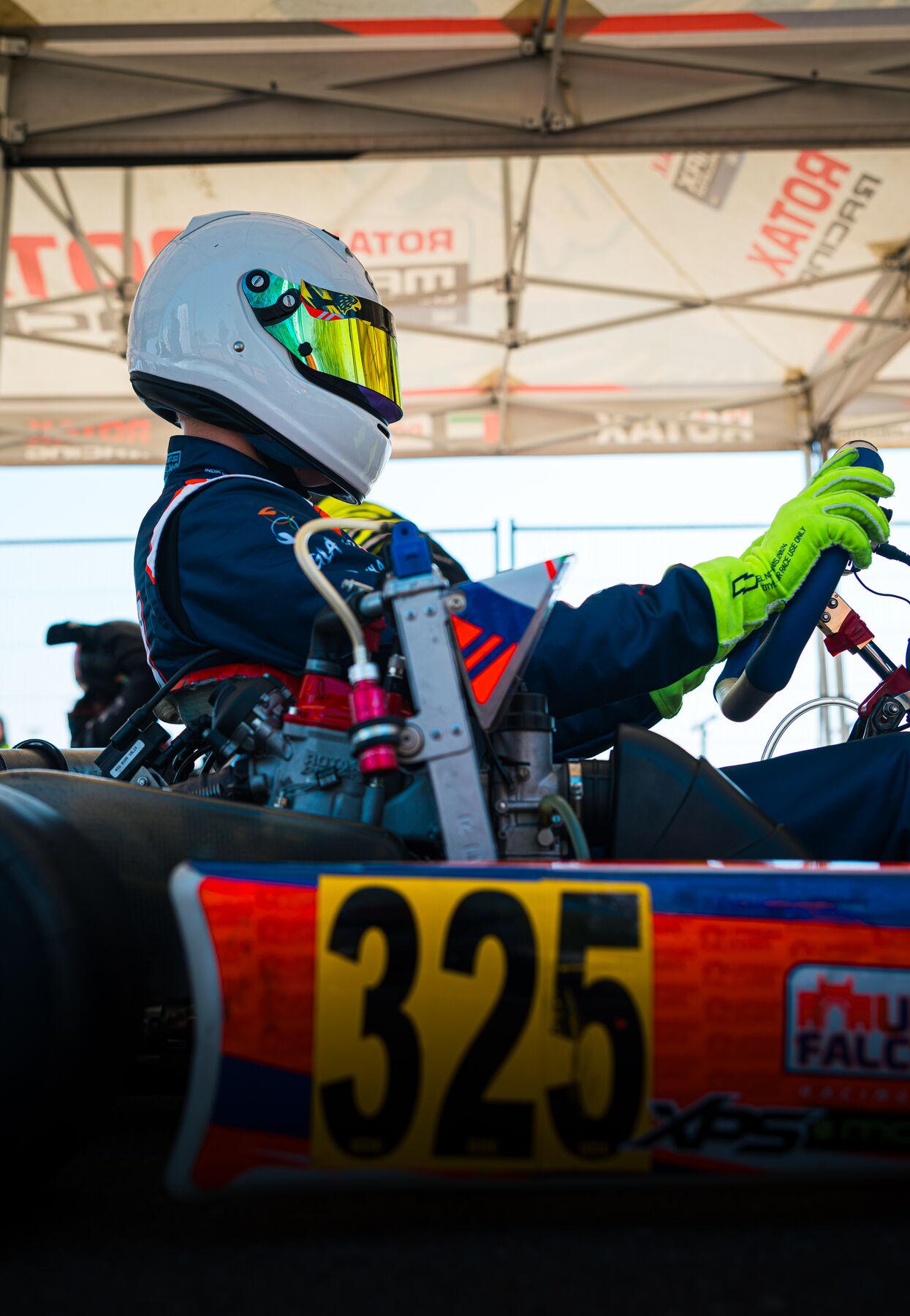 Damian Knorr seated in kart #325 before the session