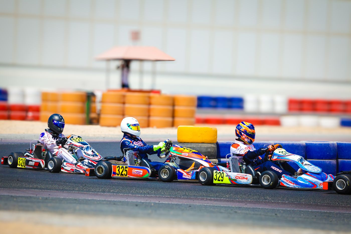Karts #328, #325 and #329 cornering at Dubai Kartdrome