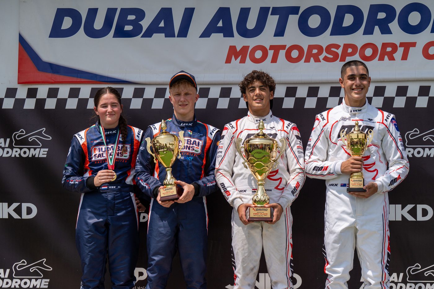 Damian Knorr on the DAMC Cup podium with Mumbai Falcons Racing, Dubai Autodrome